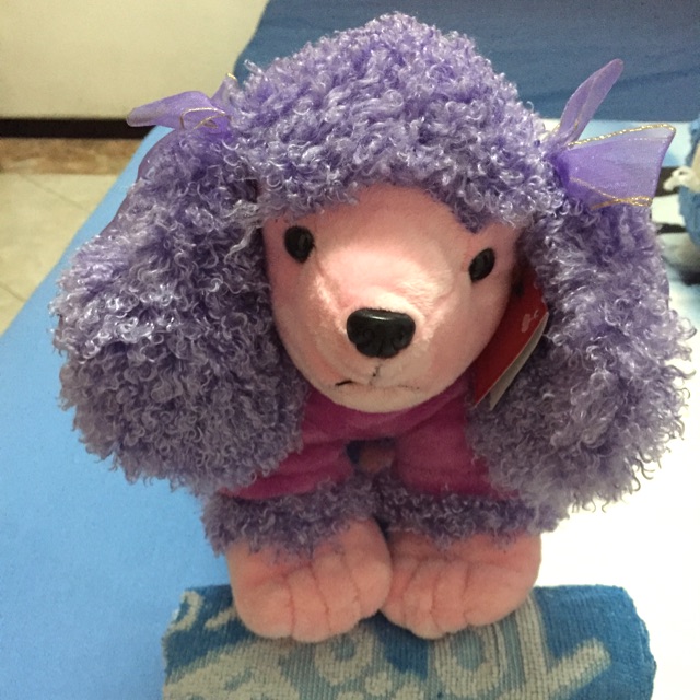 Boneka anjing imut