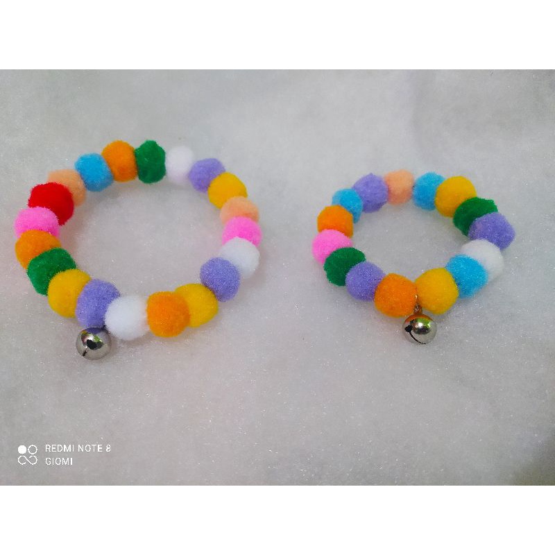 kalung lonceng pom pom