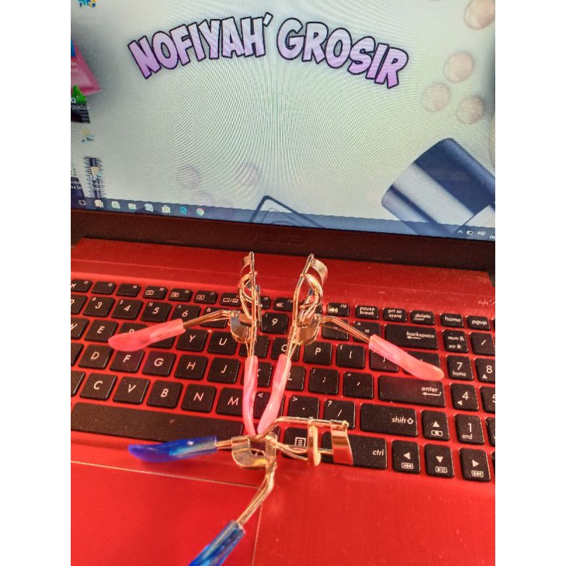 PENJEPIT BULU MATA