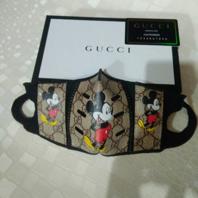 Masker Guci mickey mouse