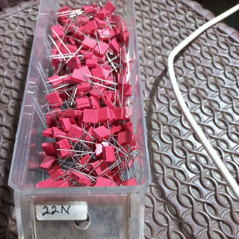 kapasitor 22n merah