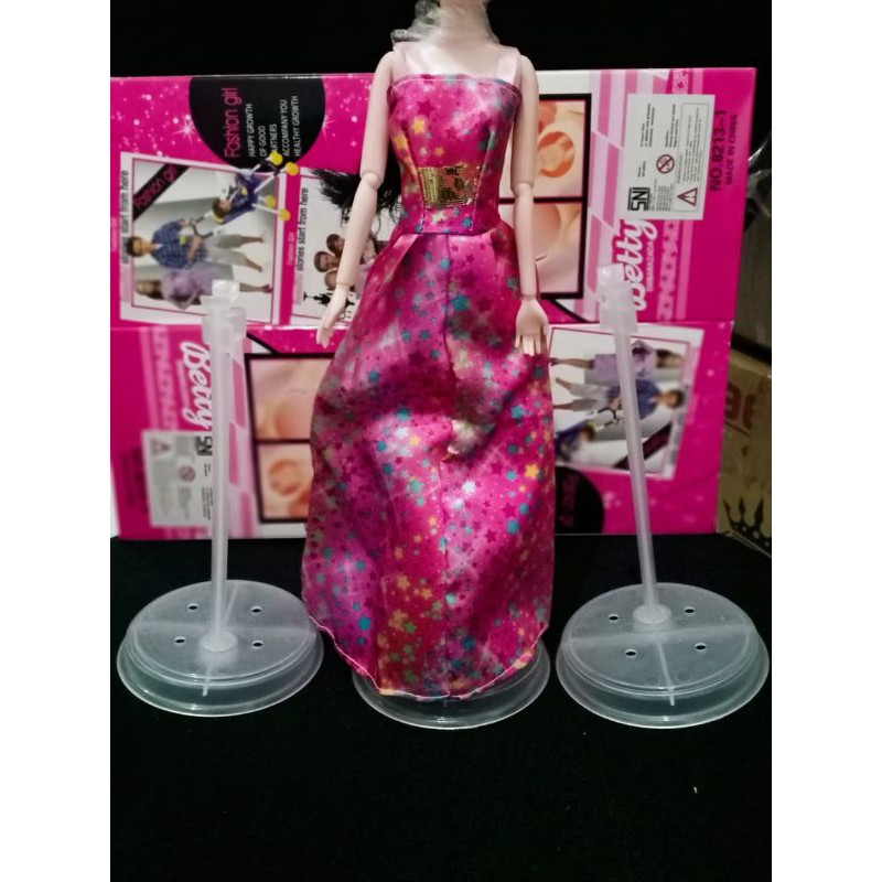 stand buat boneka