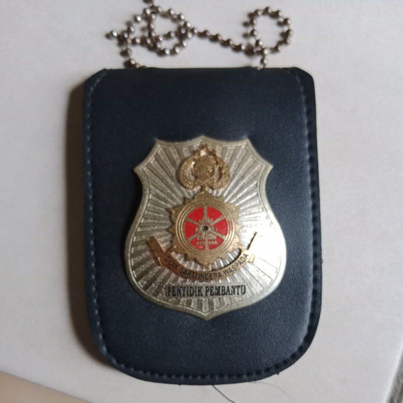 dompet gantung penyidik