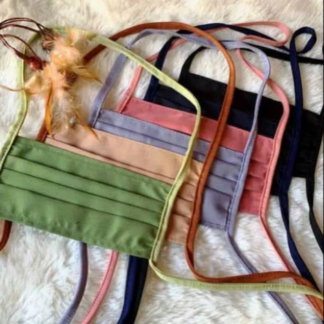 Masker bahan oxford gratis