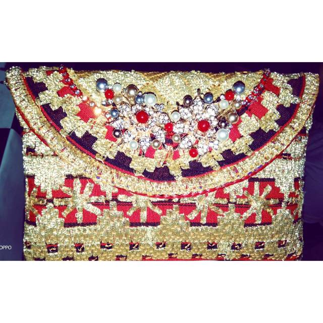 Clutch tapis lampung