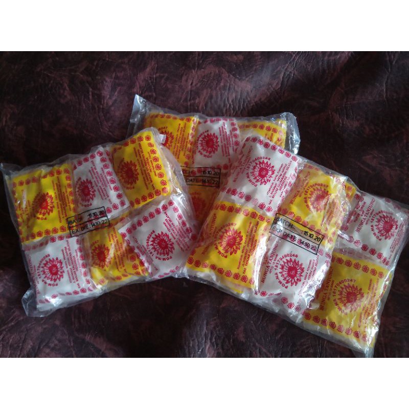 Bedak Dingin Cap Bunga Tanjung