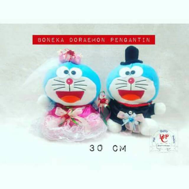 COD Boneka Doraemon Weding Gaun Pink