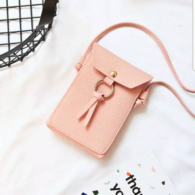 Joan mini sling bag pocket
