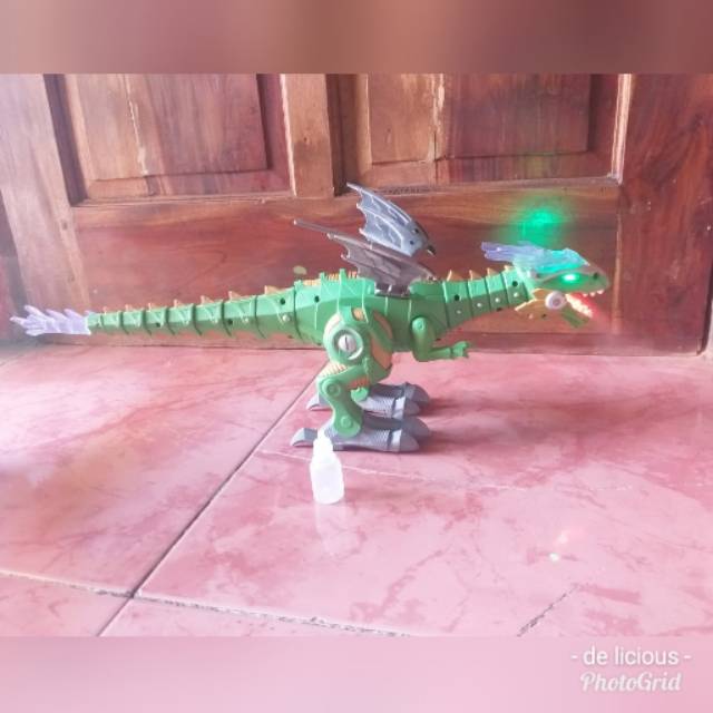 Mainan dino keluar asap dingin
