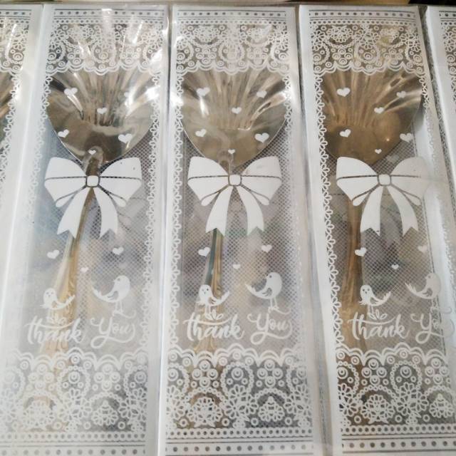 Souvenir centong stenlis kerang