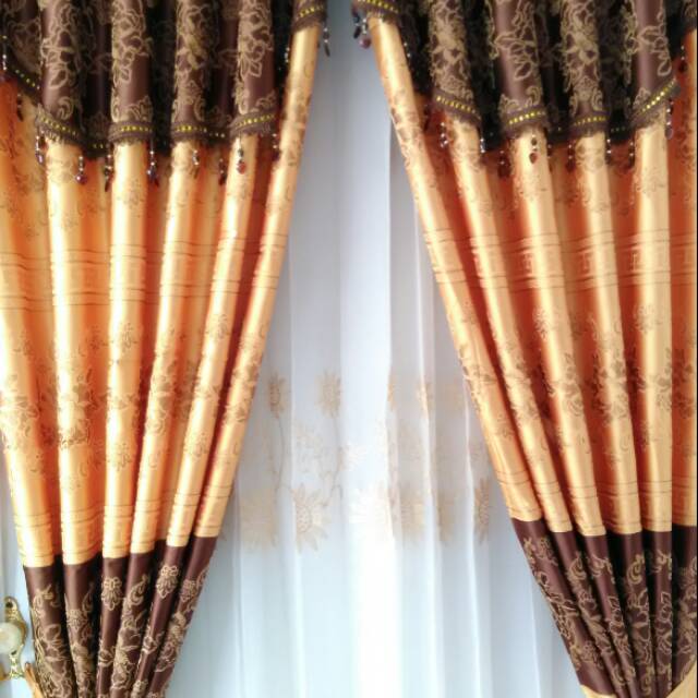 Prada oriontal coklat