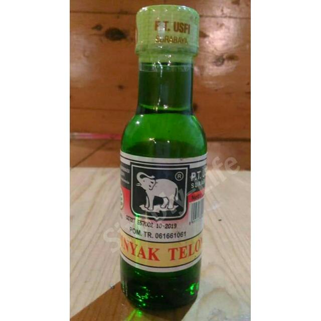 Minyak TELON<br/>Cap Gajah Botol Beling