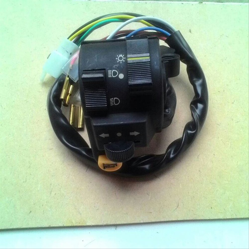 Saklar lampu kiri WIN NEW