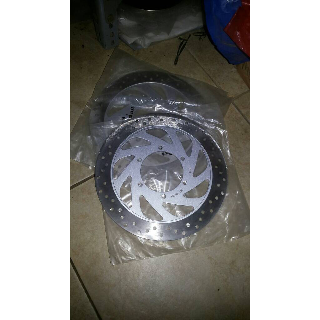 cakram depan scorpio