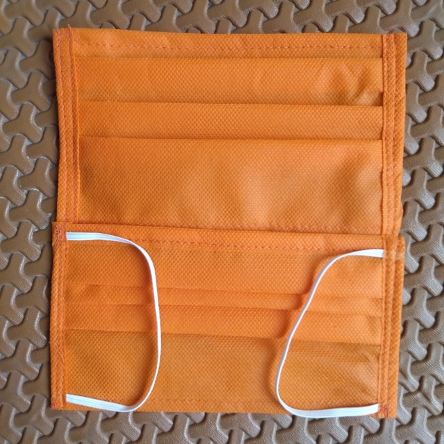 Masker spunbond orange