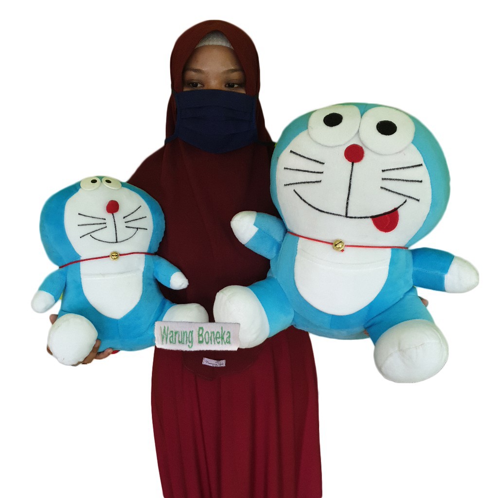 sepasang boneka doraemon size XL dan M