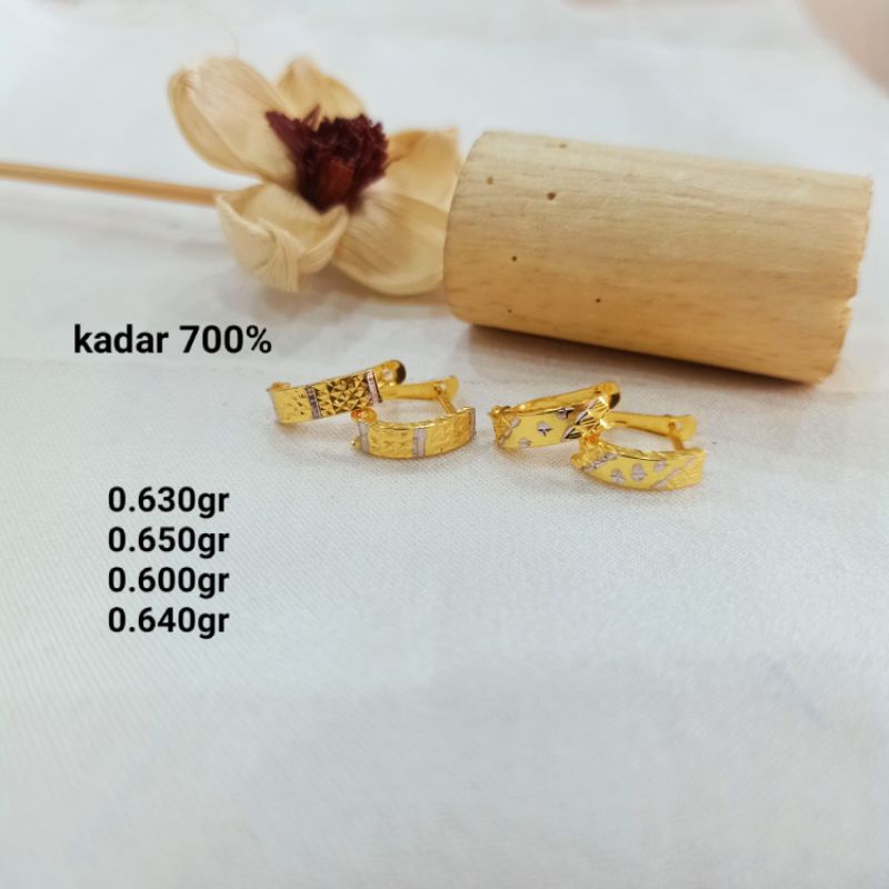 anting jepit kadar 700%