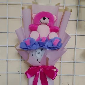 buket boneka hotpink bunga biru murah