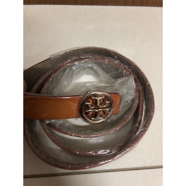 Tali pinggang Tory Burch.