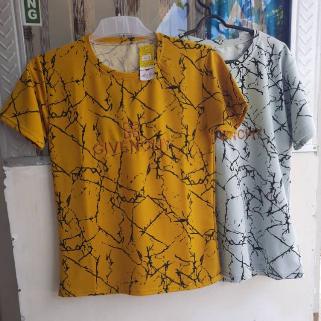 Kaos import logo bordir