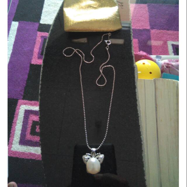 Kalung mutiara kupu