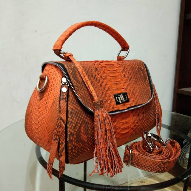 Tas kulit piton model tas resteting
