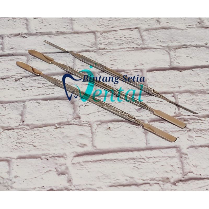 CEMENT SPATULA / SPATULA LOGAM PITH