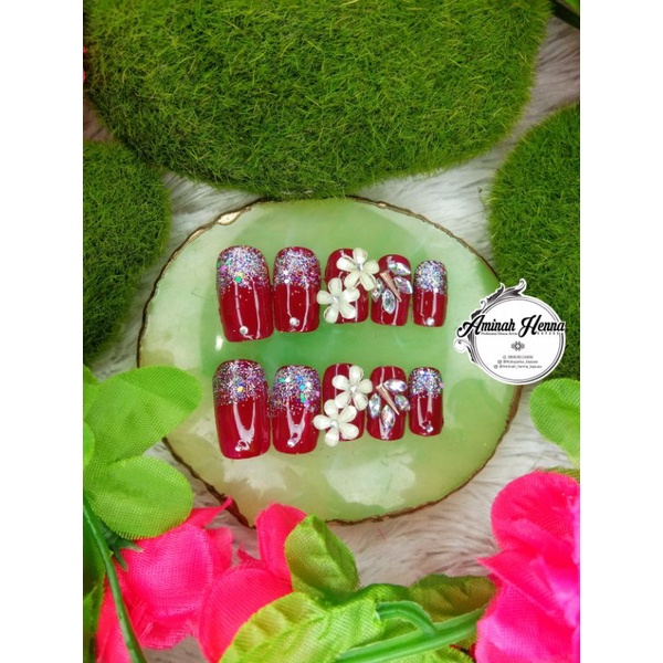 kuku palsu maroon