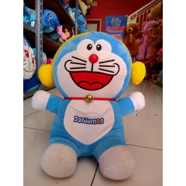 Boneka doraemon handset kuning