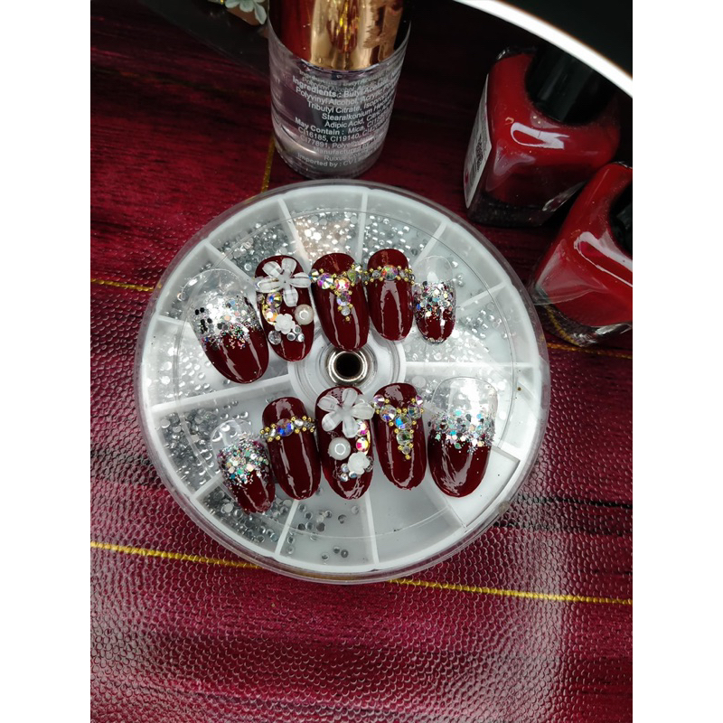 kuku palsu maroon