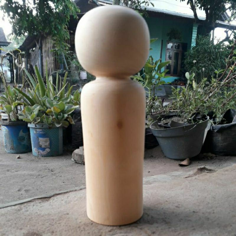 boneka kayu mentahan