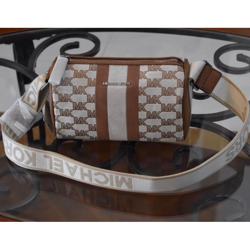 MK COOPER MINI DUFFLE CROSDBODY BROWN MULTI