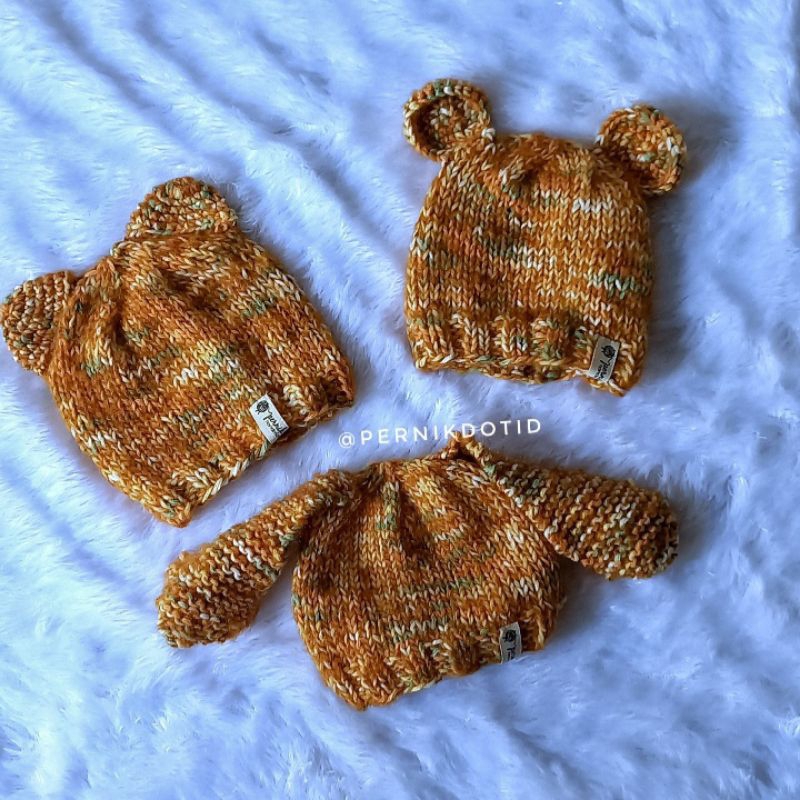 topi bayi karakter