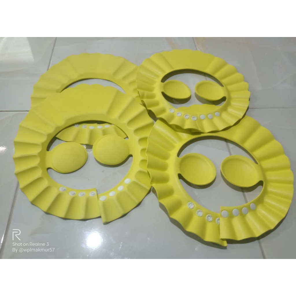 topi keramas bayi model kancing