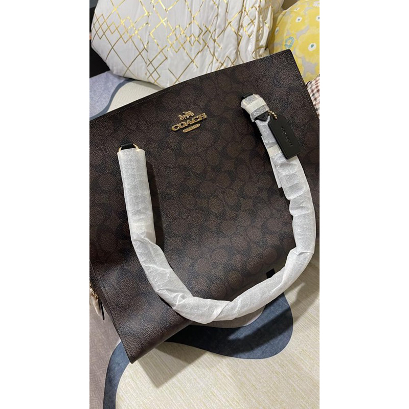 coach tiga preloved