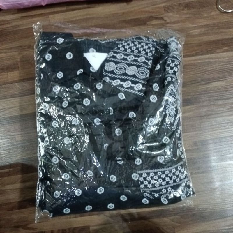 baju kk yuni