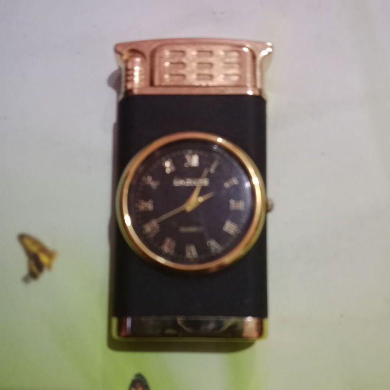 korek motif Jam