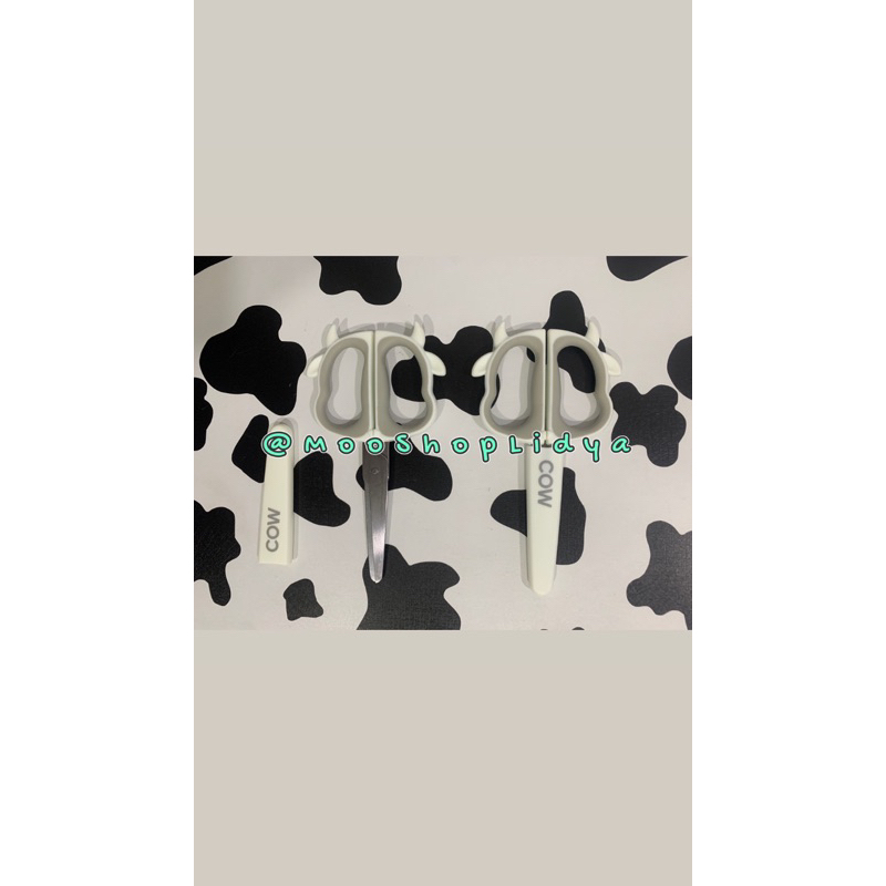 Gunting motif sapi