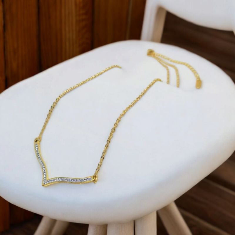 kalung model V bahan titanium