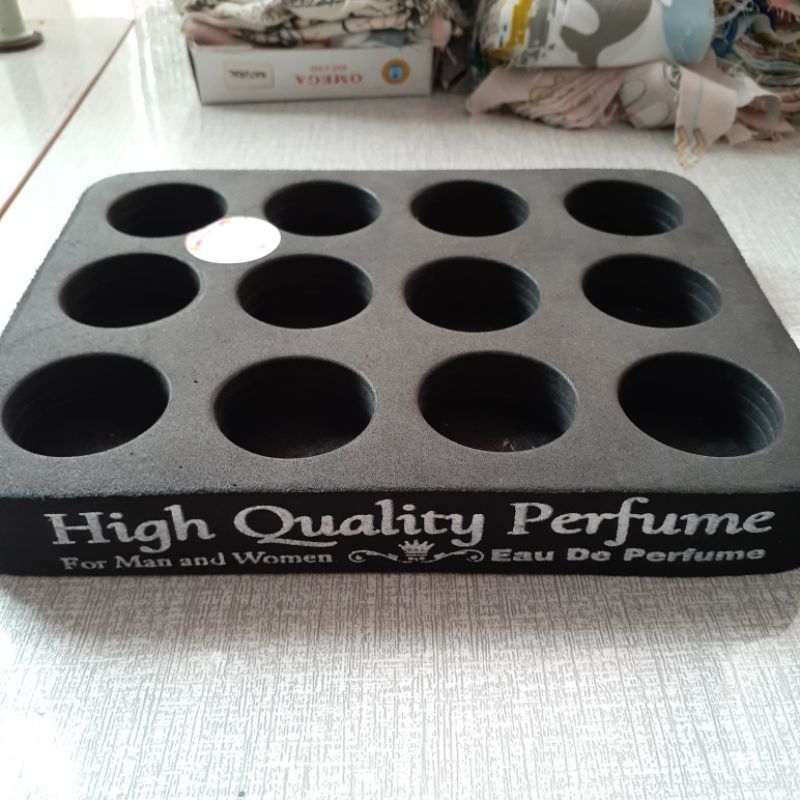 Tatakan Parfum