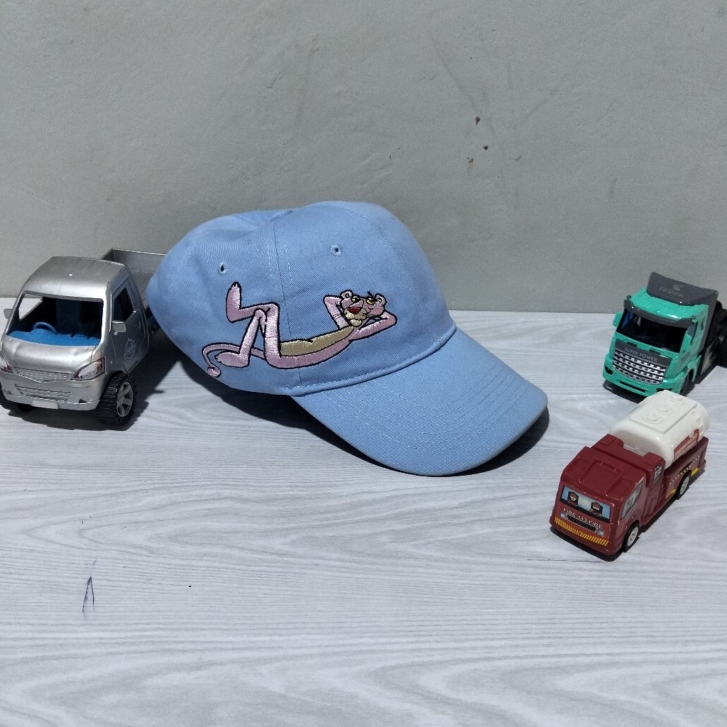 topi manntan