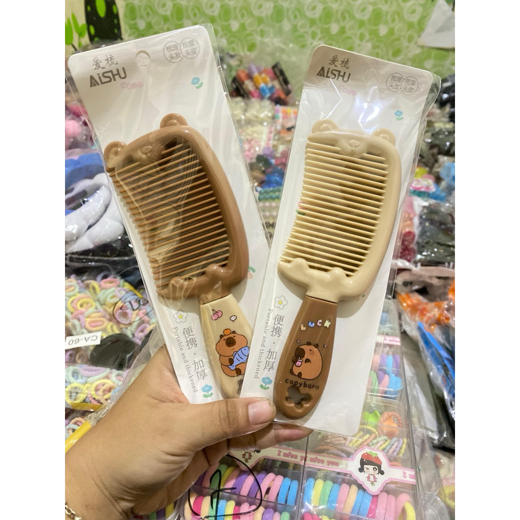 sisir rambut 9k