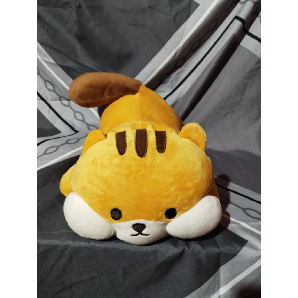 boneka tupai baring