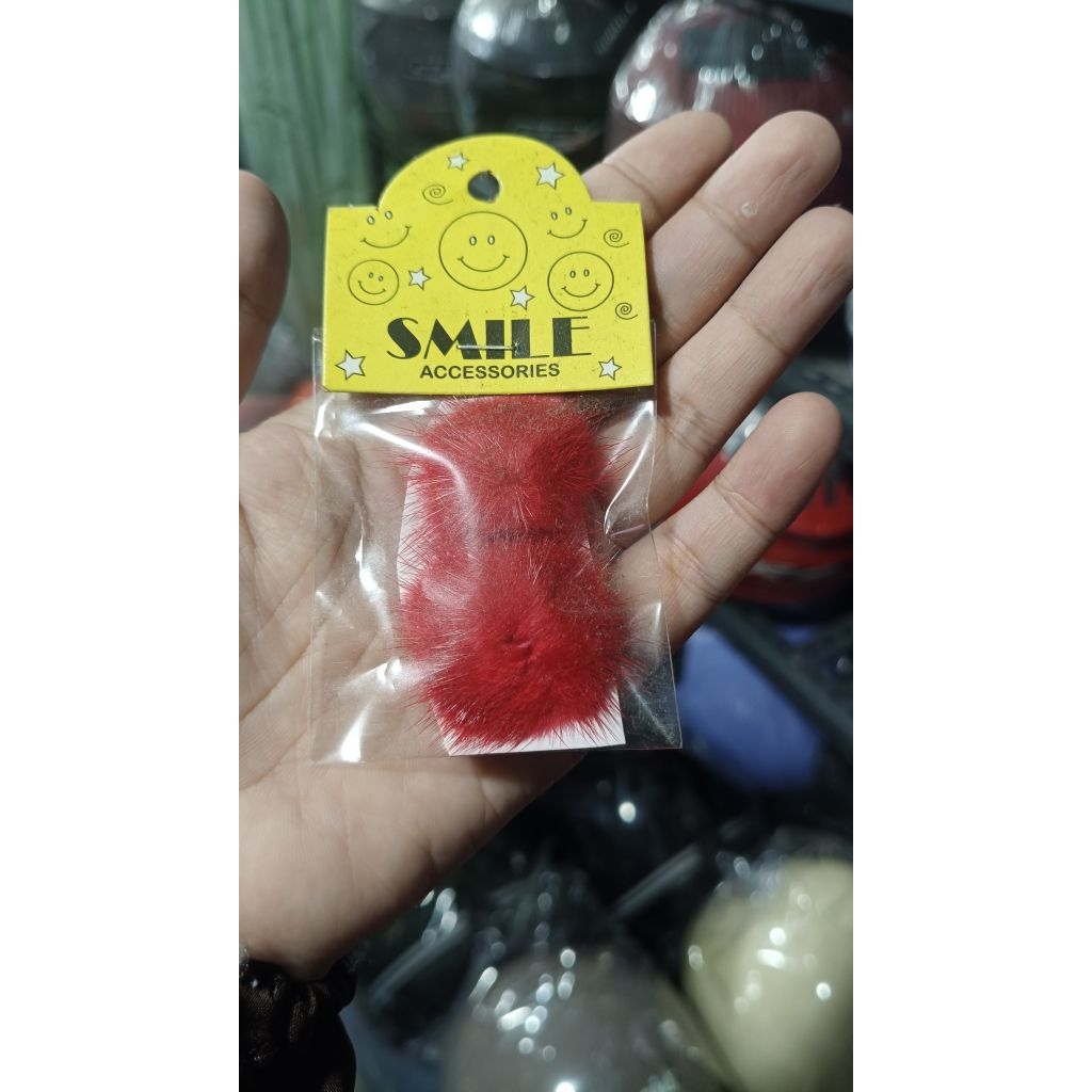 pom-pom merah