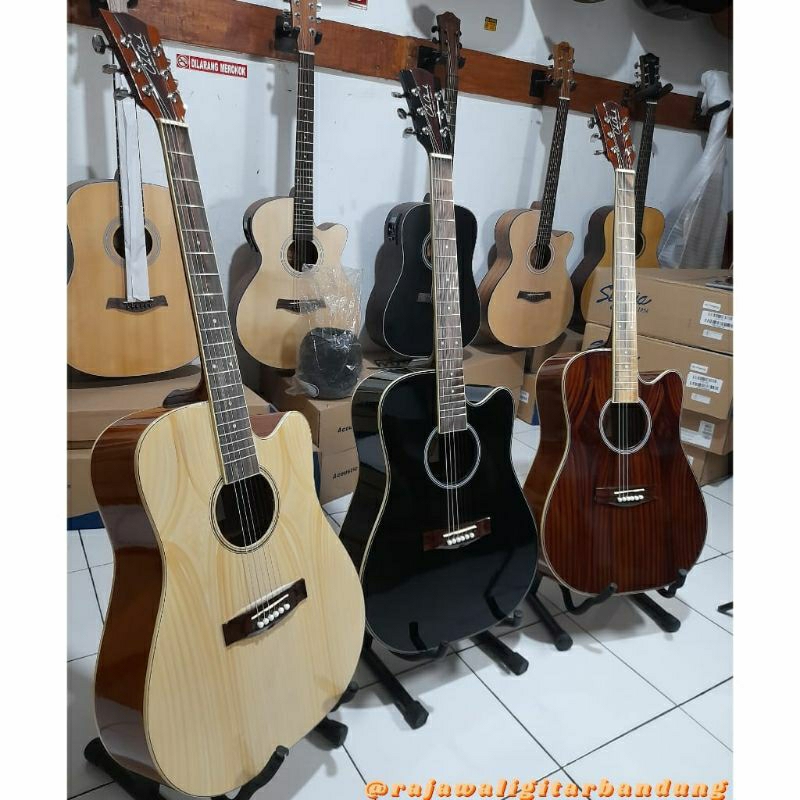 Gitar akustik model Cle Clark jumbo
