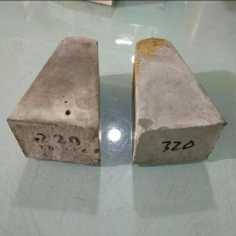 Batu Poles Segitiga
