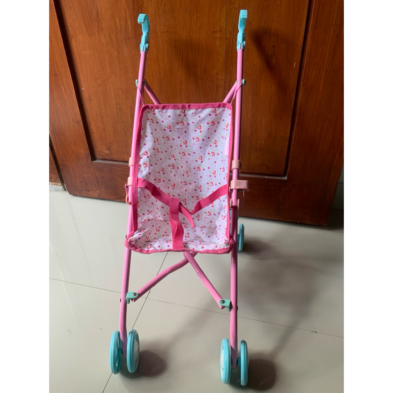 elc cup cake stroller doll