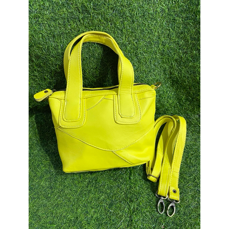 tas given percah kulit asli