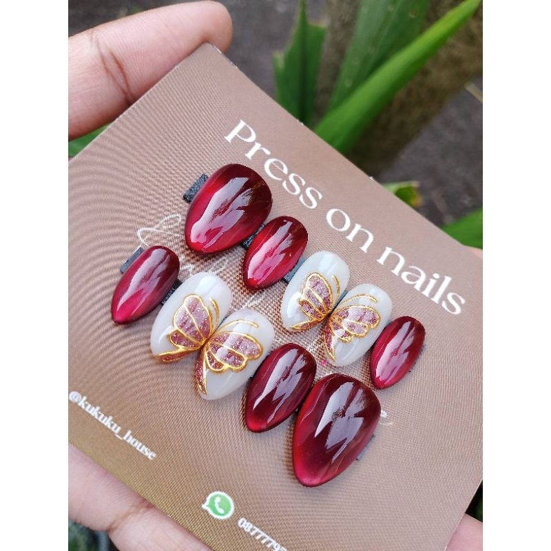 Cat eye maroon butterfly