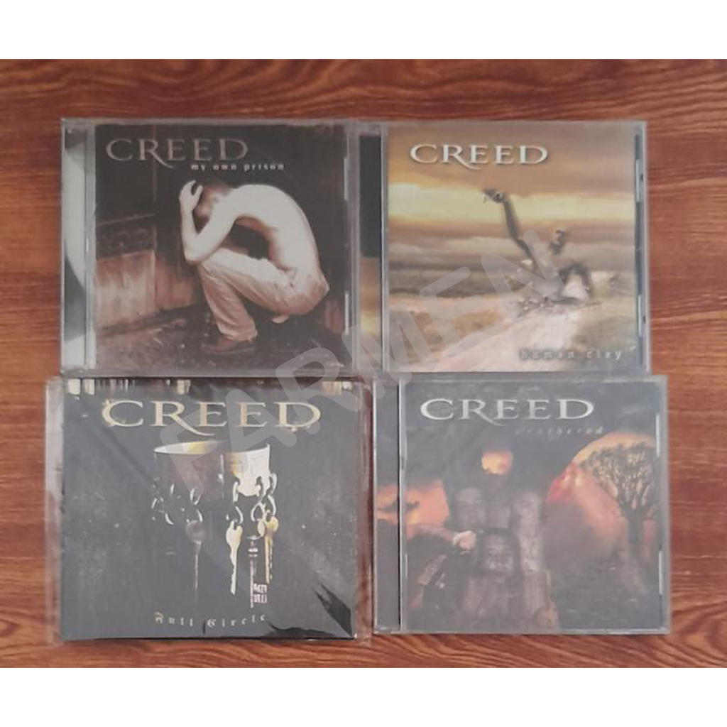 CD CREED ORIGINAL  .
